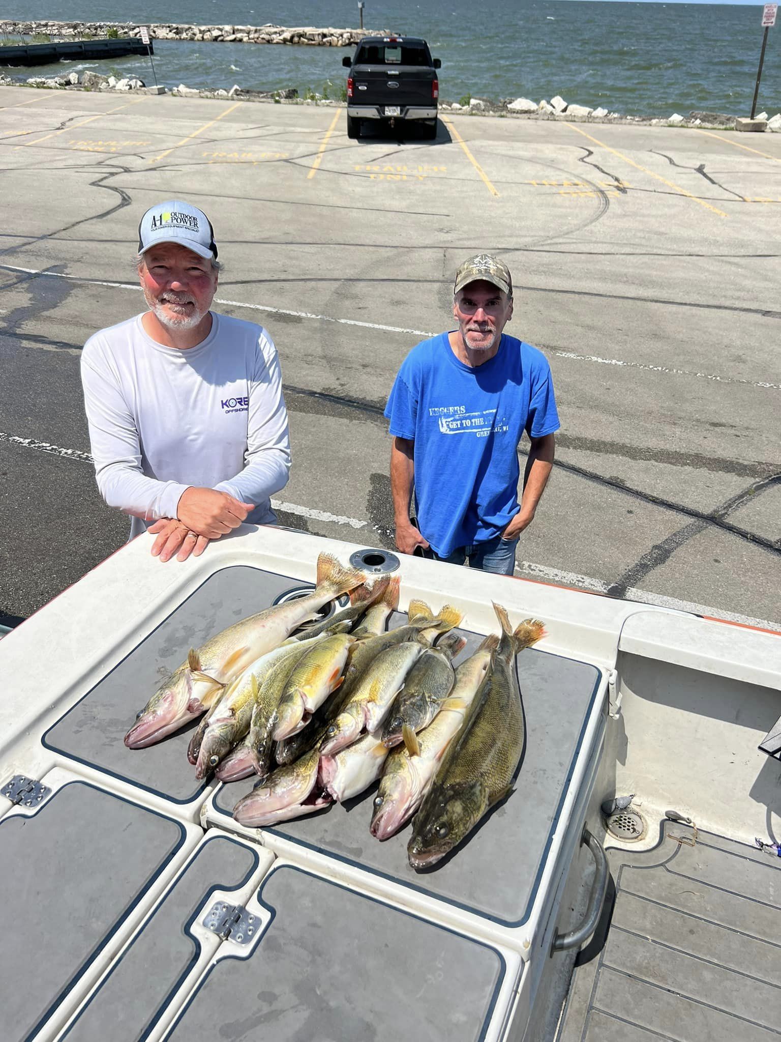 Anglers with their walleye catch after an Exclusively Walleye charter