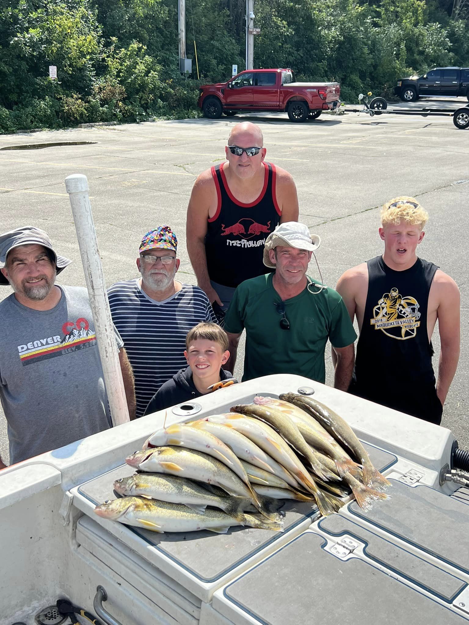 Exclusively Walleye clients with their walleye catches after a fishing trip